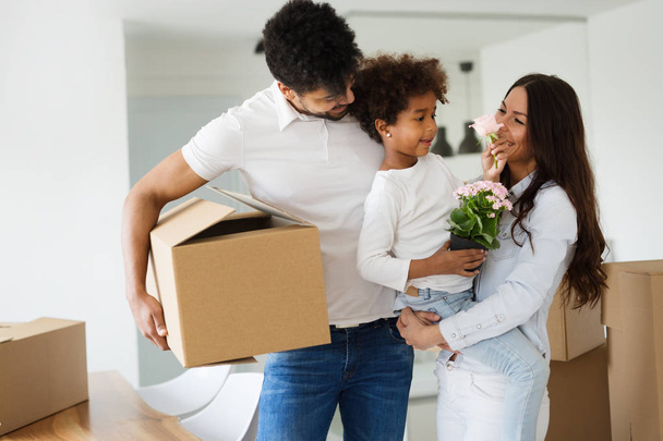 Cute family moving into their new home - Photo, image