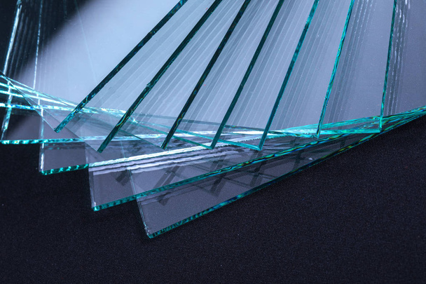 Sheets of Factory manufacturing tempered clear float glass panels cut to size - Photo, Image