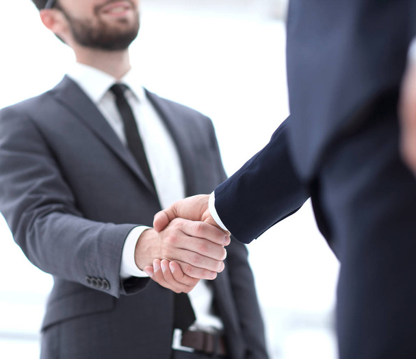 Two businessman shaking hands - 写真・画像