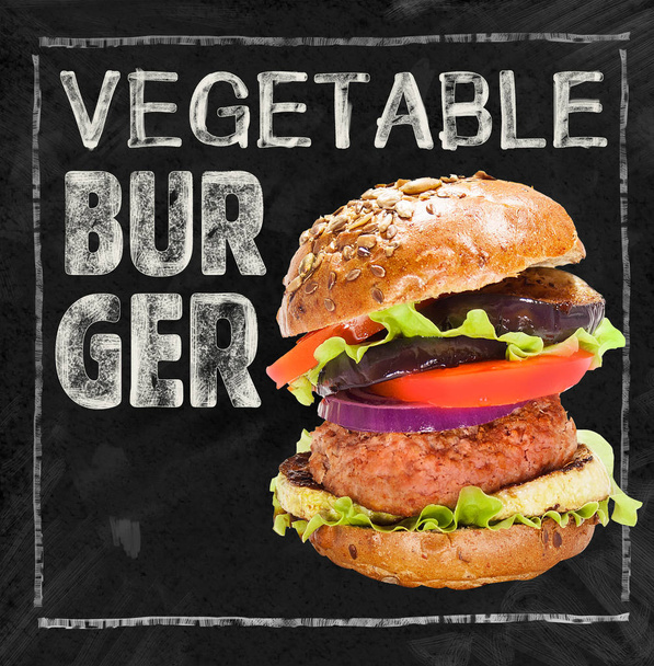 Veggie Burger on a black chalkboard. Place for text. Healthy lifestyle. - Photo, image