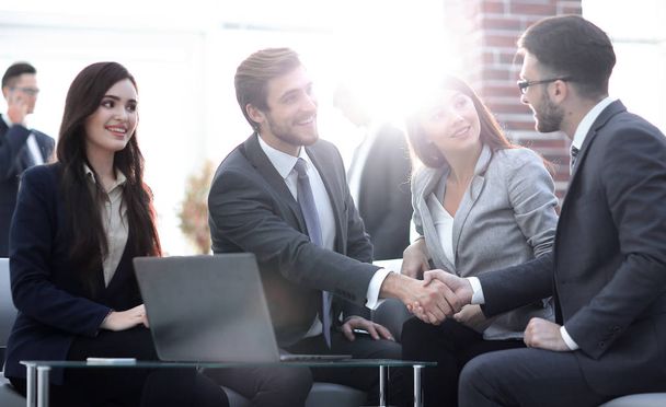 Successful partnership in business displayed by shaking hands in - Fotoğraf, Görsel