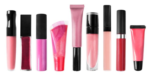Collection of liquid lip gloss on white background - Photo, image