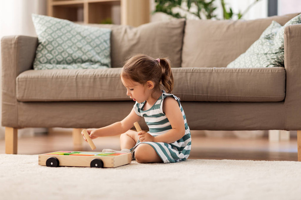 happy baby girl playing with toy blocks at home - Φωτογραφία, εικόνα