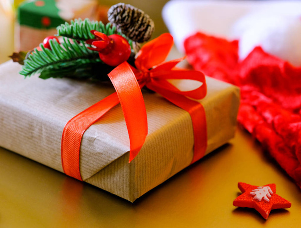 Christmas gift box on an yellow background - 写真・画像