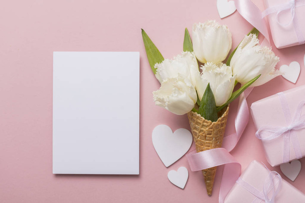 Flat-lay waffle cone with white flower blossom - Foto, Imagem