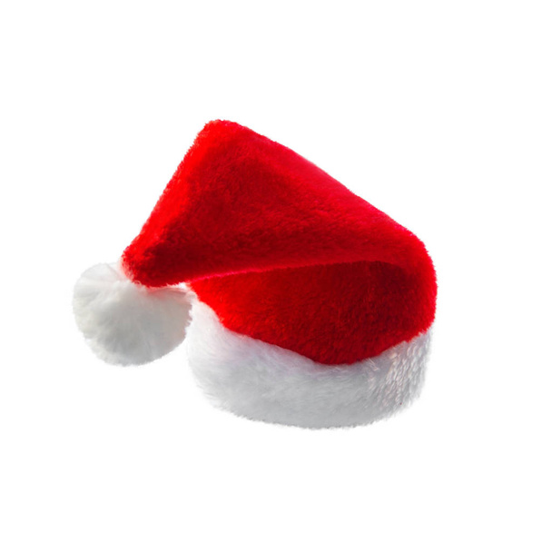 Красная шляпа Санта изолирована на белом фоне
. - Фото, изображение
