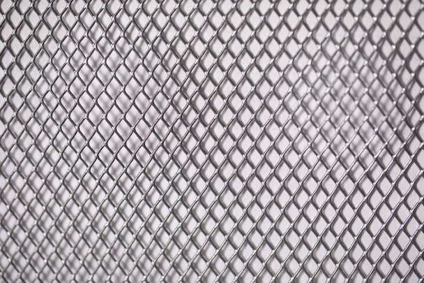griglia quadrata su sfondo bianco parete metallica primo piano
 - Foto, immagini
