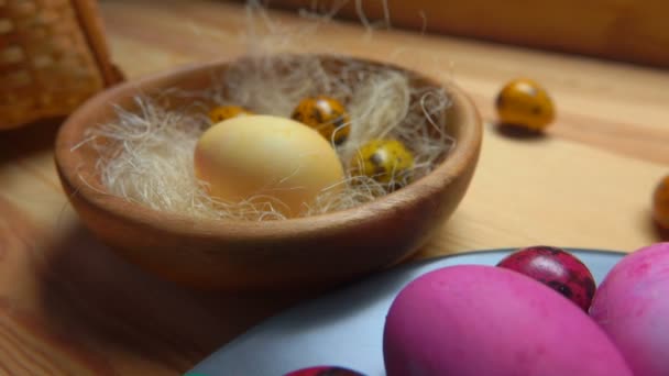 Panorama of festive painted easter eggs laid on a plate - Footage, Video