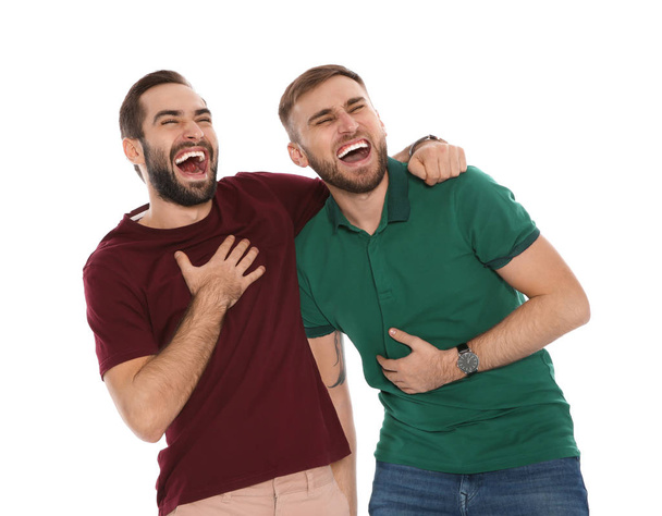 Portrait of young men laughing on white background - Fotoğraf, Görsel