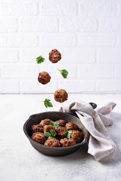Homemade beef meatballs in frypan - Photo, Image