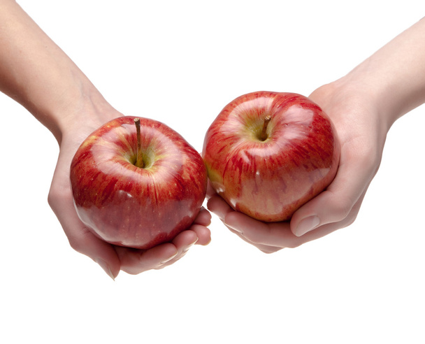 Two hands give each other an apple - Fotoğraf, Görsel
