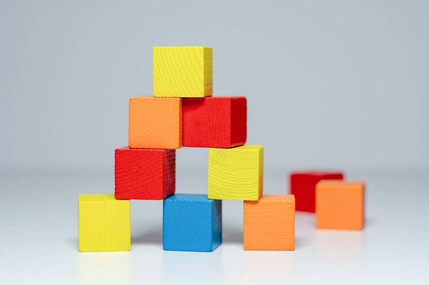 Building from wooden colourful childrens blocks - Photo, Image