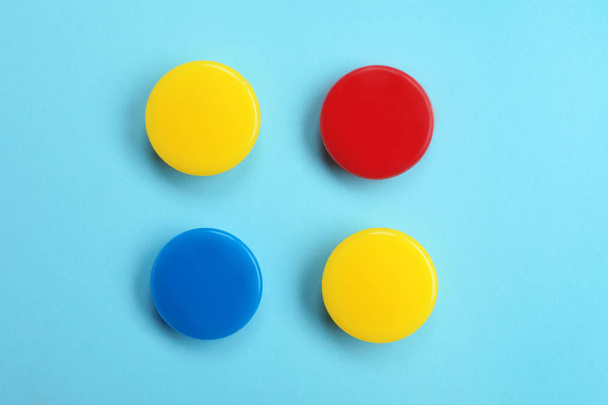 Bright magnets on color background, top view - Photo, Image