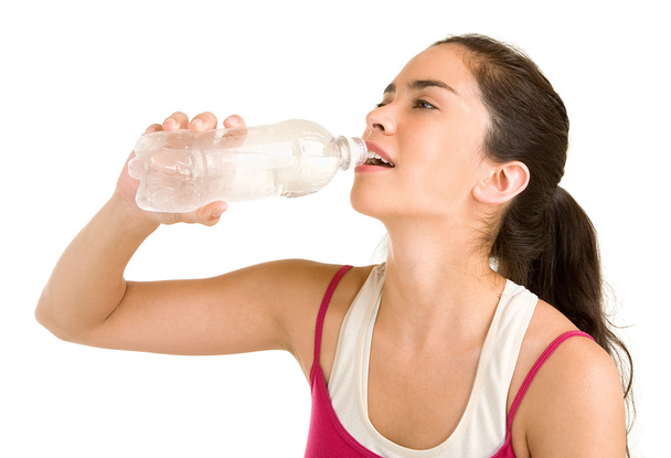 ワークアウト後の女性の飲料水 - 写真・画像