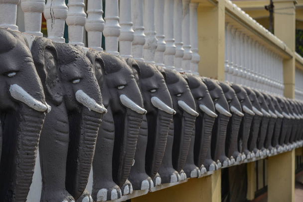 Statues of elephant head at Buddhist temple in Colombo, Sri Lanka. - Photo, Image