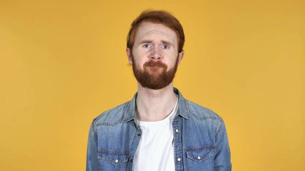Redhead Man Shaking Head to Reject Isolated on Yellow Background - Photo, Image