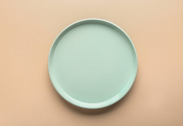 Stylish plate on color background - Fotografie, Obrázek
