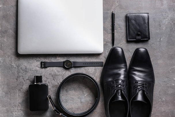 Stylish male accessories with laptop on grey background - Fotografie, Obrázek