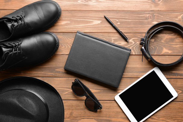 Stylish male accessories with tablet PC on wooden background - Foto, Imagen