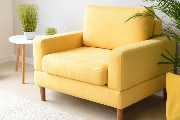 Comfortable armchair in modern room - Zdjęcie, obraz