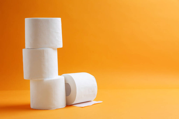 Rolls of toilet paper on color background - Photo, Image