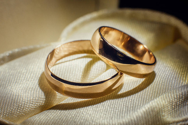 Two gold wedding rings close up. - Photo, Image