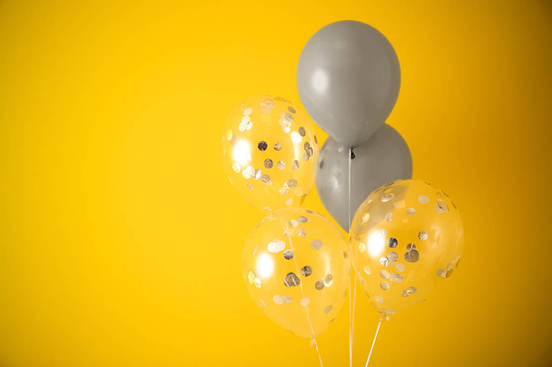 Balloons on color background - Photo, Image