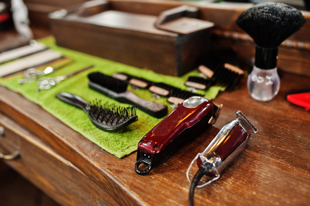 Barber tools on wooden background table with electric machines. - Foto, Imagem