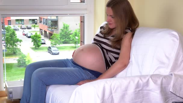 Loving future mom wait for new family member birth. Woman ninth pregnancy month - Filmagem, Vídeo