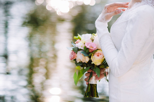 bride holds wedding bouquet. soft focus - Φωτογραφία, εικόνα