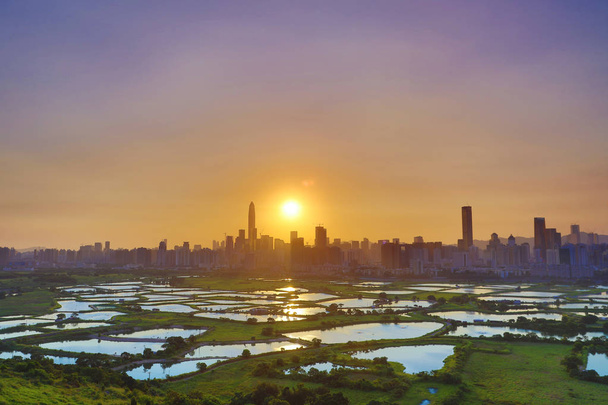 HK Maaseudun auringonlasku, riisipelto moderni toimistorakennukset
 - Valokuva, kuva