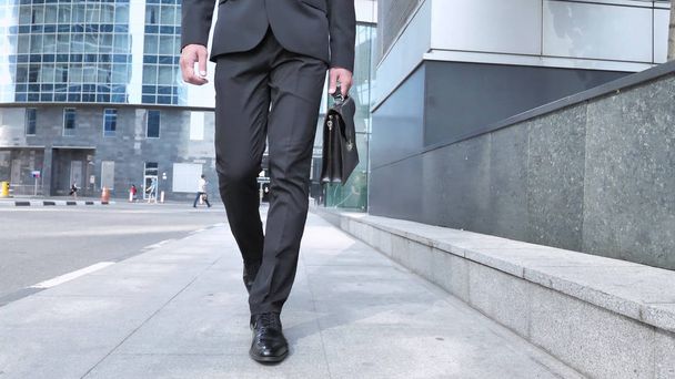 Walking Legs of Businessman in Suit - Photo, Image