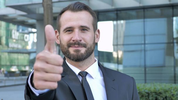 Thumbs Up by Successful Businessman - Фото, изображение