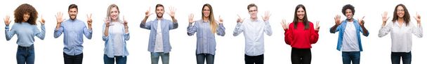 Composition of african american, hispanic and caucasian group of people over isolated white background showing and pointing up with fingers number seven while smiling confident and happy. - Photo, Image