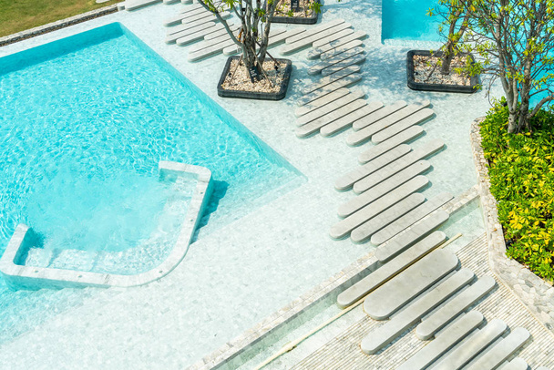 Aerial view of Beautiful luxury hotel swimming pool resort with walk way - Foto, Imagen