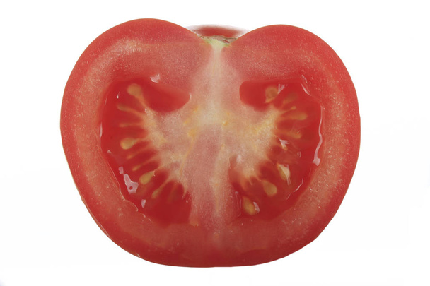 Piece of tomato isolated on white background - Photo, Image