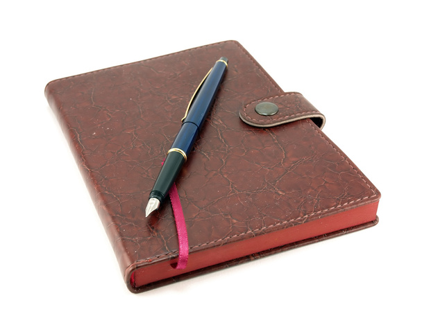 Cuaderno y pluma
 - Foto, Imagen
