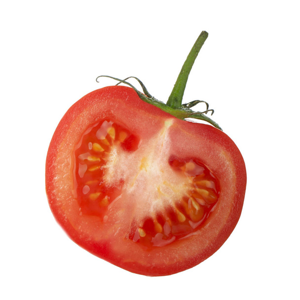 Piece of tomato isolated on white background - Photo, image