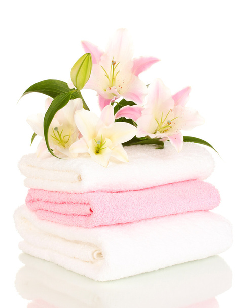 beautiful lily on towel isolated on white - Foto, imagen