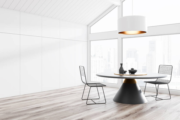 Corner of attic dining room with white walls and ceiling, wooden floor, big window, round table with metal chairs and massive ceiling lamp. 3d rendering - Foto, afbeelding