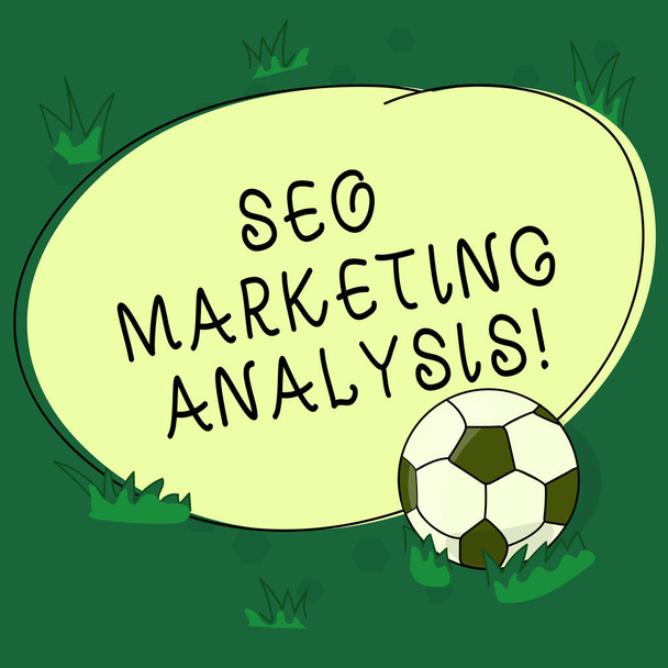Text sign showing Seo Marketing Analysis. Conceptual photo improve a given website s is ranking on search engines Soccer Ball on the Grass and Blank Outlined Round Color Shape photo. - Photo, Image