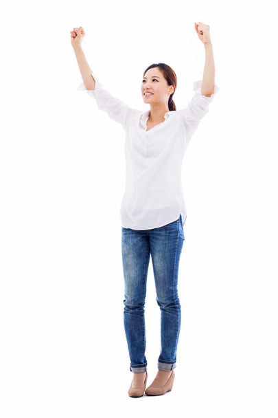 Happy young asian woman hands up shot - Photo, image