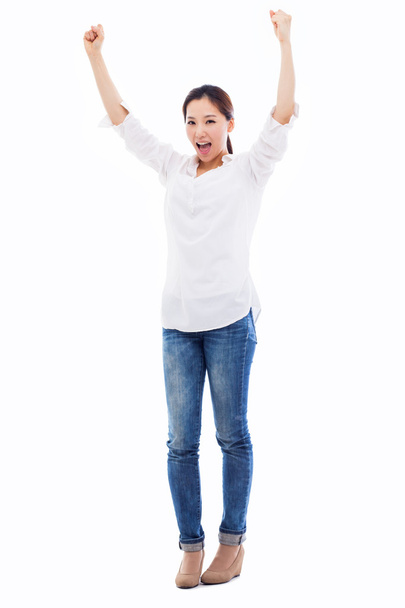 Happy young asian woman hands up shot - Photo, Image