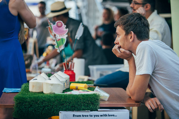MOSCOW - 22 AUGUST, 2015 : Popular hipster event called design market Le Picnic took place at Dewars Powerhouse and gathered young designers and artists - Fotoğraf, Görsel