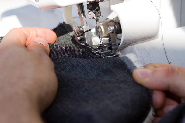 Closeup details of tailors work on a sewing machine.  - Foto, Bild