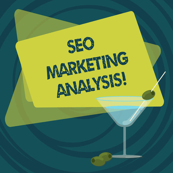 Text sign showing Seo Marketing Analysis. Conceptual photo improve a given website s is ranking on search engines Filled Cocktail Wine Glass with Olive on the Rim Blank Color Text Space. - Photo, Image