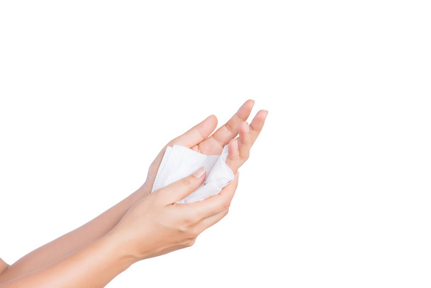 Vrouw schoonmaken van haar handen met een tissue. Gezondheidszorg en medische concept. - Foto, afbeelding