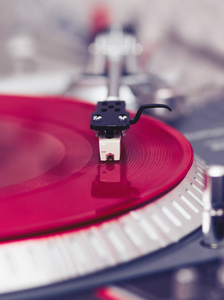Professional vinyl record player playing music loud - 写真・画像