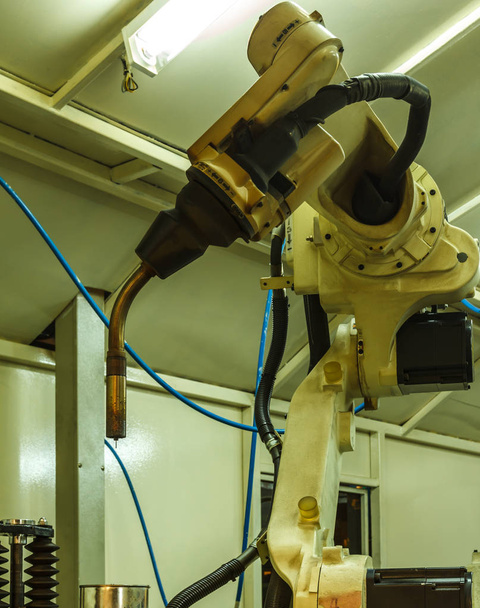 Robots lassen team in de auto-onderdelen-industrie - Foto, afbeelding