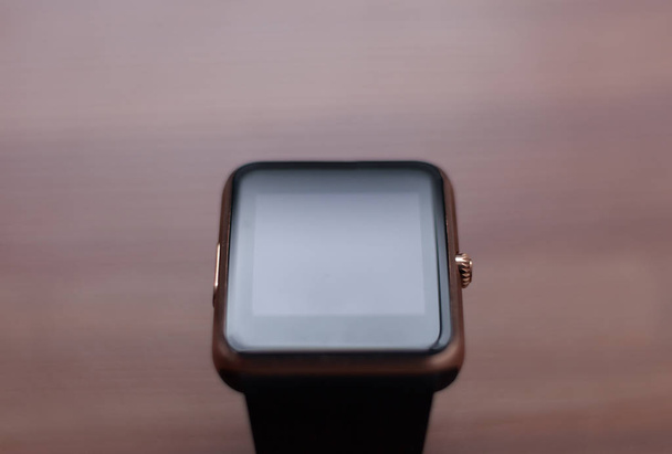 Close up of smart wrist watch. Modern wearable technology - 写真・画像